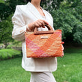 The Solana hat-style woven Handbag - Patterned Natural, Yellow, and Pink