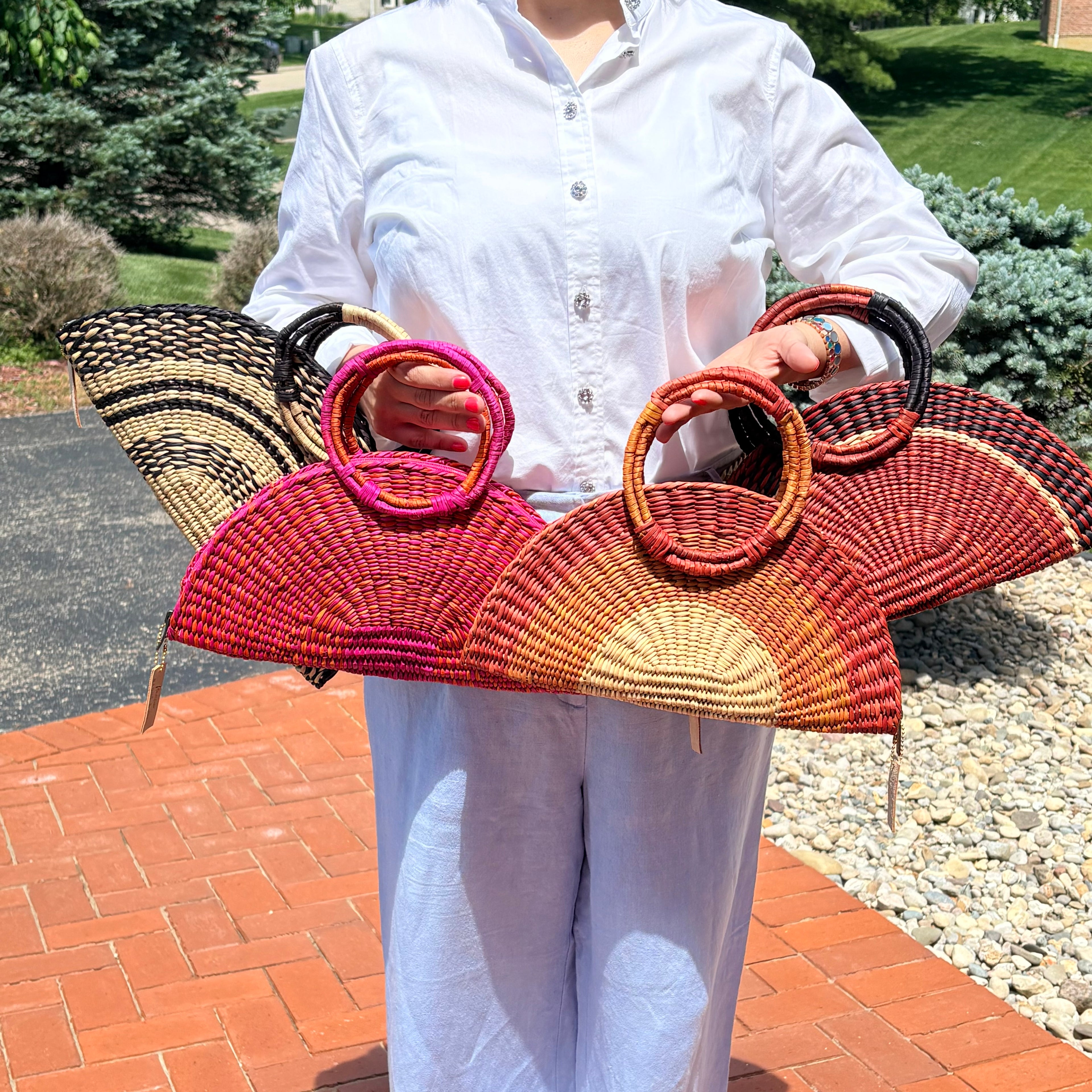The Half Moon Escapade Clutch with Woven Handles
